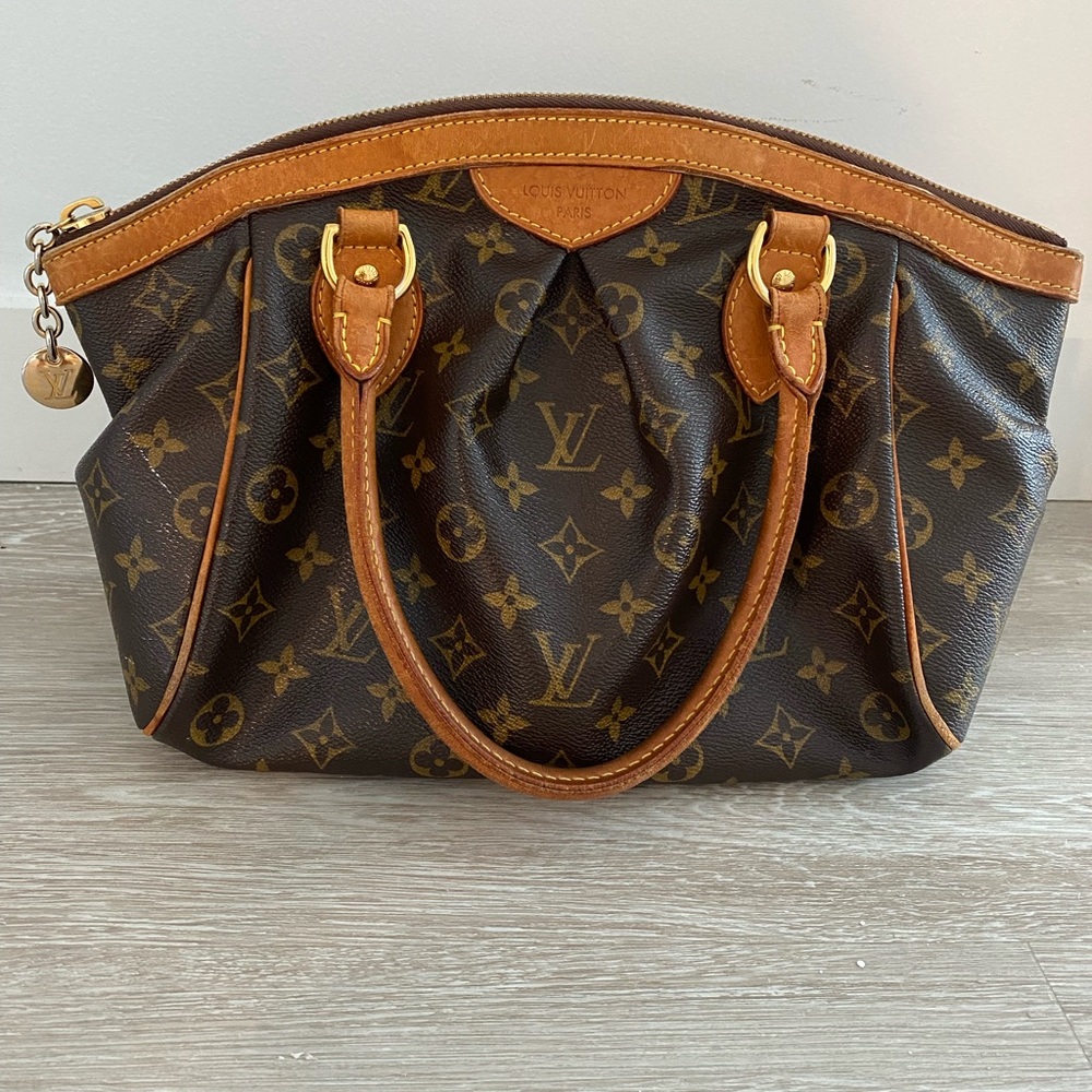 Authentic, Pre-owned Louis Vuitton Tivoli Monogram PM Bag. Great condition.